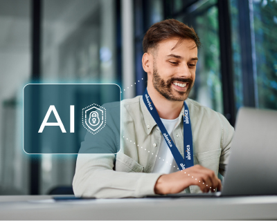 Man working at his laptop with translucent AI logo to his left